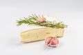Rougette cheese with fresh rosemary and garlic isolated on white background Royalty Free Stock Photo