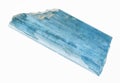 rough aquamarine (blue beryl) crystal on white