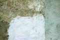 rough background made of natural cement of an old texture in the form of a retro wall. fragment of the wall is painted Royalty Free Stock Photo