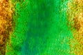 Rough and battered green paint texture on a rusted metal surface showing scratches. Royalty Free Stock Photo
