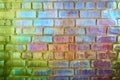 Rough brick wall iridescent colors of rainbow