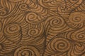 Rough brown spiral patterned background