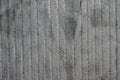 Rough concrete wall airbrushed by silver graffiti paint. Royalty Free Stock Photo