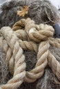 Rough Cord made from natural plant on the background of fiber. Rope detail, closeup. Vertical. Vintage. Copy space Royalty Free Stock Photo