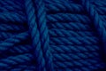 Rough Cord made from natural plant fiber. Rope detail, closeup. Wallpaper, background about fabtic manufacture, eco friendly