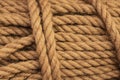 Rough Cord made from natural plant fiber. Rope detail, closeup. Wallpaper and background about fabtic manufacture, eco