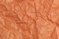 Rough crumpled texture surface of retro vintage classic grunge paper. Background or backdrop. Dark orange, Brown tone Royalty Free Stock Photo