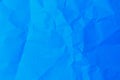 Rough crumpled texture surface of retro old vintage grunge paper. Background or backdrop. Pure or mostly pure blue Royalty Free Stock Photo