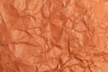 Rough crumpled texture surface of retro vintage classic grunge paper. Background or backdrop. Dark orange, Brown tone Royalty Free Stock Photo