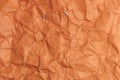 Rough crumpled texture surface of retro vintage classic grunge paper. Background or backdrop. Dark orange, Brown tone Royalty Free Stock Photo