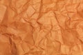 Rough crumpled texture surface of retro vintage classic grunge paper. Background or backdrop. Dark orange, Brown tone Royalty Free Stock Photo
