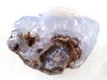 rough crystal of blue Chalcedony gemstone on white