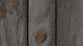 Rough Dark Gray Distressed Wood Panel Texture with Knots, Ideal for Backgrounds and Designs Royalty Free Stock Photo