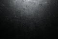 Rough, dark stone background lit by spotlight Royalty Free Stock Photo