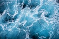 Rough deep turquoise and blue Mediterranean sea with white foam texture background Royalty Free Stock Photo