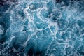 Rough deep turquoise and blue Mediterranean sea with white foam texture background Royalty Free Stock Photo