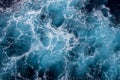 Rough deep turquoise and blue Mediterranean sea with white foam texture background Royalty Free Stock Photo