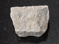 rough gray Dolomite stone on dark background Royalty Free Stock Photo