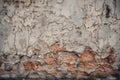 Rough and gritty concrete wall with cracks and stains, creating a textured and urban wallpaper Royalty Free Stock Photo