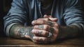 Rough male hands with tattoos and dirty fingernails on a rough wooden table. Generative AI Royalty Free Stock Photo