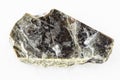 rough muscovite mica stone on white marble Royalty Free Stock Photo