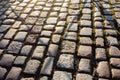 Rough old stone footpath with moss, close up image Royalty Free Stock Photo