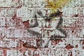 Rough painted brick wall with star stenciled on it - Grunge background