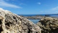 Rough piece of rock on the seashore, Syracuse, Sicily