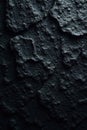 Rough, porous black stone surface Deep shadows, natural texture , obsidian, stone, dark Royalty Free Stock Photo