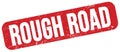 ROUGH ROAD text on red grungy stamp sign