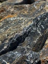 Rough rock surface showing natural texture and patterns Royalty Free Stock Photo