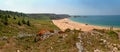 Rough rocky coastal panoramic landscape of Brittany with blue sky. Royalty Free Stock Photo