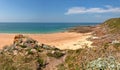 Rough rocky coastal panoramic landscape of Brittany with blue sky. Royalty Free Stock Photo