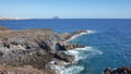 Rough and rocky landscape of the coastal walking path from Montana Amarilla to Amarilla Golf and Golf Del Sur, Tenerife, Spain Royalty Free Stock Photo