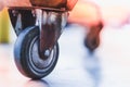 Rough and rustic wheel of shopping cart Royalty Free Stock Photo