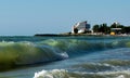 The rough sea. Big waves. The Black Sea coast, in Romania. Beachfront hotel in Costinesti resort