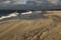 Rough sea with dark clouds of sand. Storm