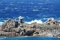 Rough sea and furious waves smack into the rocks at the beach of Santa Teresa di Gallura, Sardinia, Italy.