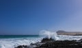 Rough sea with Mountain on Corralejo beach Canary islands Spain Royalty Free Stock Photo