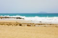 Rough sea in Playa las Cucharas with Fuerteventura island on the background, Costa Teguise, Lanzarote Royalty Free Stock Photo