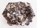 rough Sphalerite with Galena ore on white marble