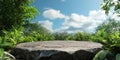 A rough stone podium placed in a natural setting, surrounded by lush greenery and a clear, blue sky Royalty Free Stock Photo