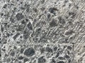 Rough stone rock cement wall pattern of the building for background and textured Royalty Free Stock Photo