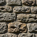 Surfaces and small pits. The stones are mortared together creating a Royalty Free Stock Photo