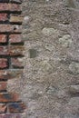 Rough stone wall with exposed bricks Royalty Free Stock Photo