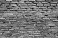 Rough stone wall made of ceramic tiles of different sizes and colors. Royalty Free Stock Photo
