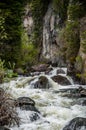 Rough stormy river in rocky mountains