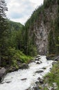 Rough stormy river in rocky mountains