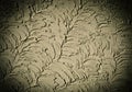 Rough Stucco Wall Texture with Decorative Swirled Patterns and a Dark Vignette for an Abstract Royalty Free Stock Photo