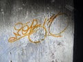 Rough surface of white wall with graffiti texture, peeling paint and yellow marks.